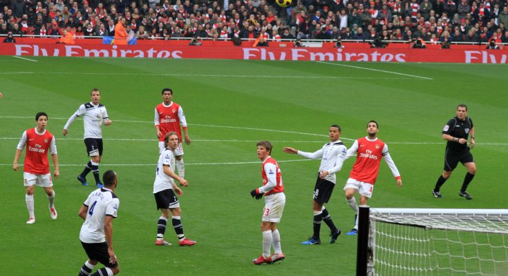 Christian Nørgaard wearing Arsenal jersey after signing
